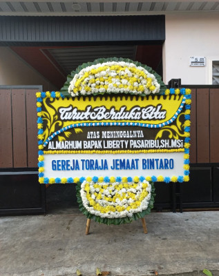 Papan Bunga Duka di Petuk Katimpun